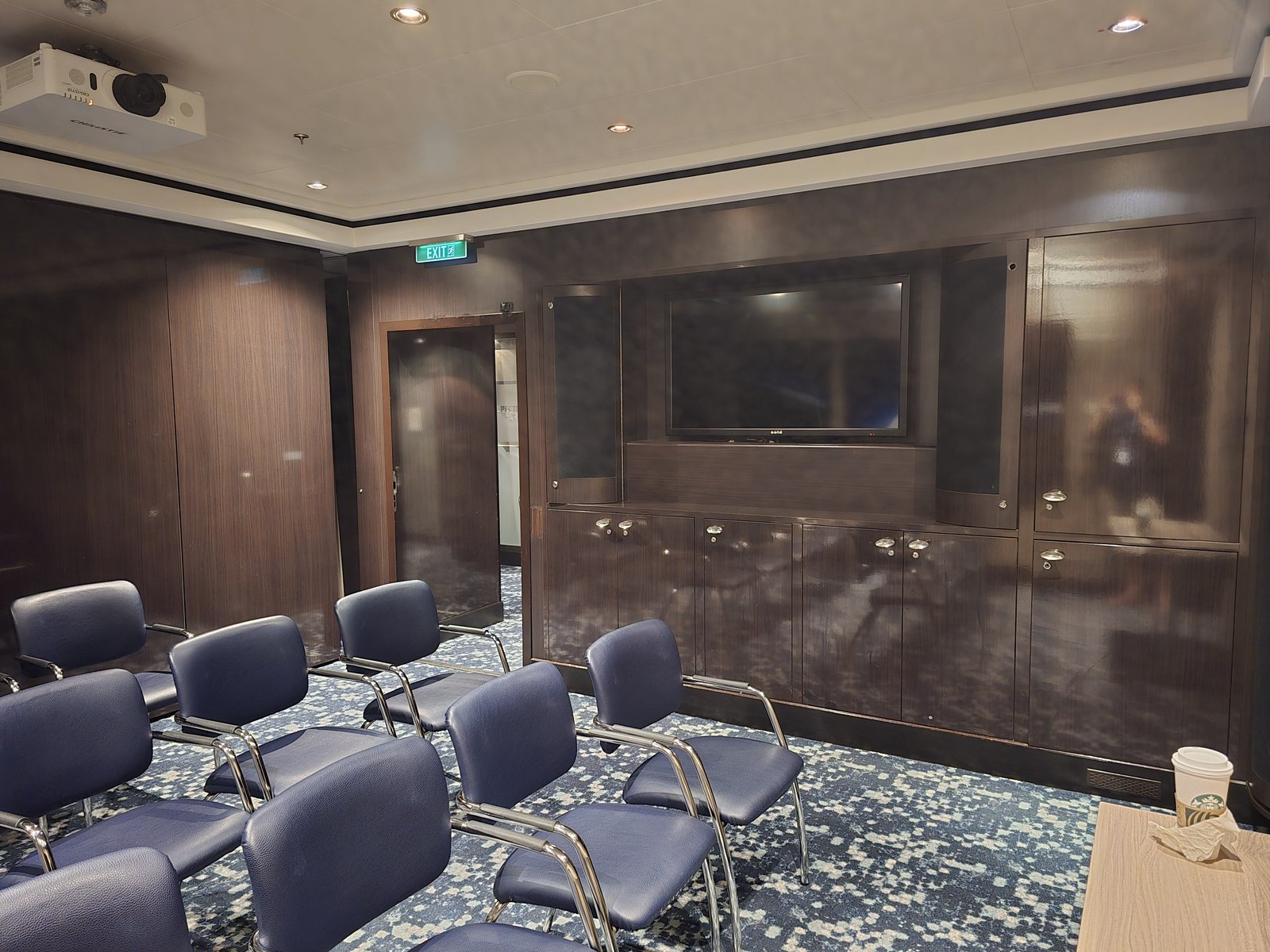 A lounge with a built-in AV screen for group gatherings