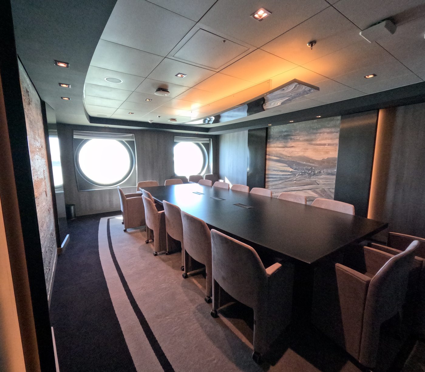 Boardroom with porthole windows aboard a cruise ship